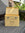 Gold storage box with 'Grow Your Own Seeds' text on a textured surface