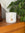 White textured pot with gold star decoration