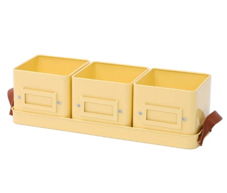 Yellow planting storage tin with three compartments on a white background