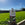 Lawn feed with a grassy field and blue sky in the background