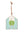 Decorative house-shaped tag with a green apple design on a white background